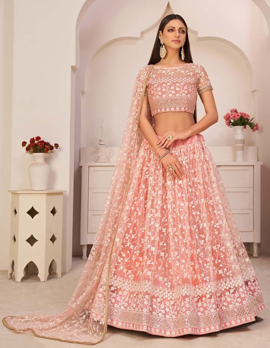 Peach embroidered net semi stitched lehenga