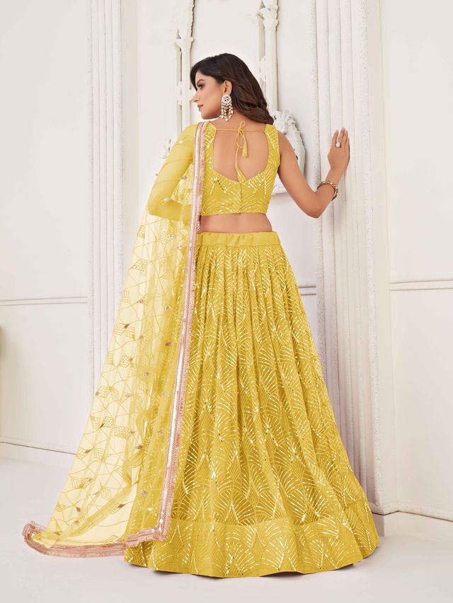 YELLOW COLOR NET FABRIC LEHENGA CHOLI