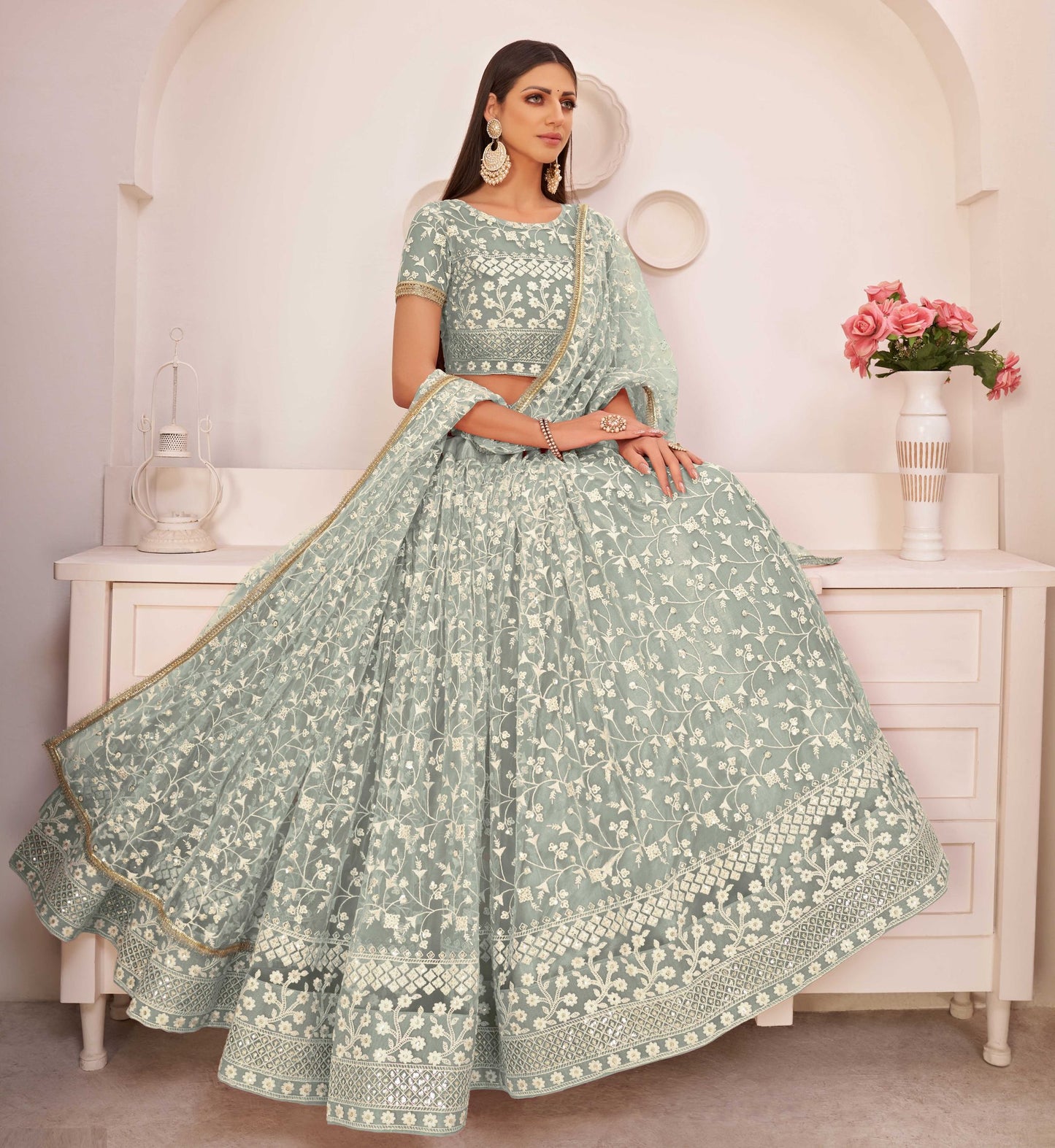 Green embroidered net semi stitched lehenga