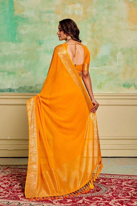 Yellow Crepe Woven Saree and Stitched Yellow Blouse