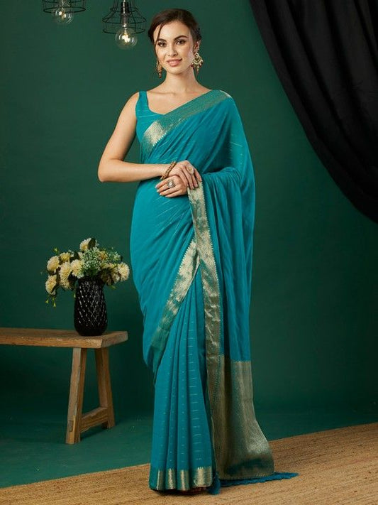 Aqua Chinnon Striped Saree With Tassels on Pallu and Stitched Aqua Blouse