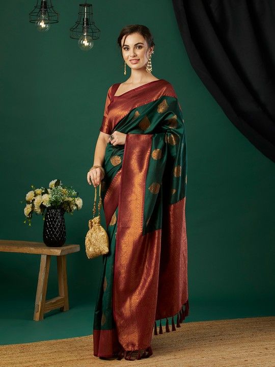 Bottle Green Banarasi Silk Woven Saree With Tassels on Pallu and Stitched Maroon Blouse