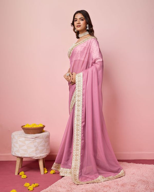 Girlie Pink Color Organza Saree With Ethnic Embroidery Work On Border And Blouse