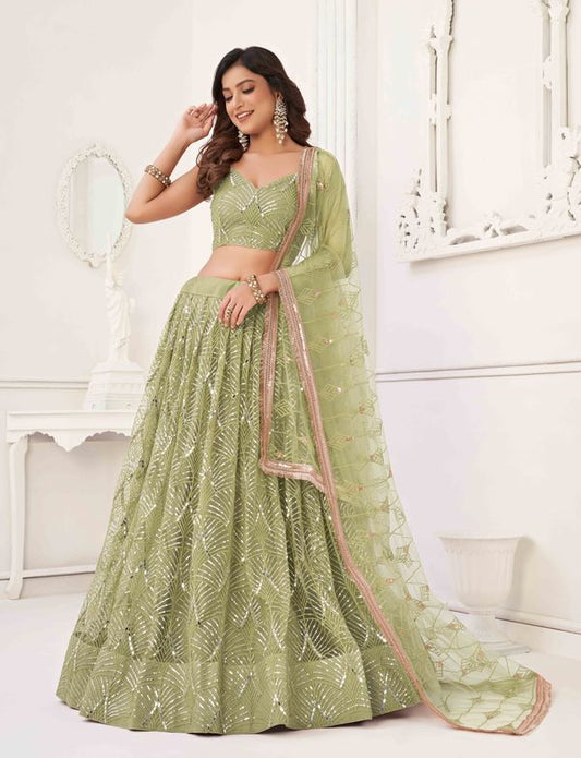 Pista Green Color Net Fabric Lehenga Choli With Sequins And Thread Embroidery Work