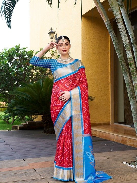 Red Crepe Digital Print Saree With Tassels on Pallu and Stitched Blue Blouse