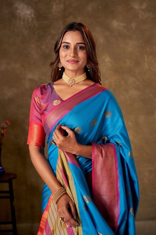 Blue Cotton Woven Saree and Stitched Pink Blouse