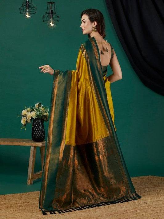 Mustard Banarasi Silk Woven Saree With Tassels on Pallu and Stitched Green Blouse