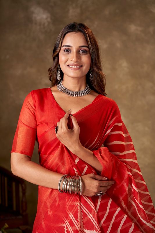 Orange Cotton Leheriya Saree and Stitched Orange Blouse