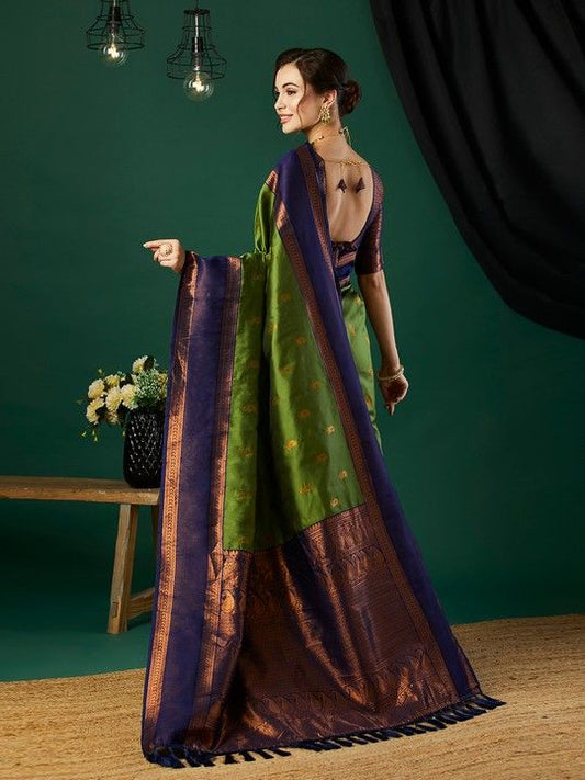 Green Banarasi Silk Woven Saree With Tassels on Pallu and Stitched Purple Blouse