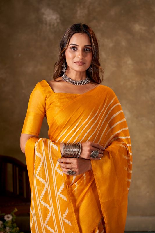 Yellow Cotton Leheriya Saree and Stitched Yellow Blouse