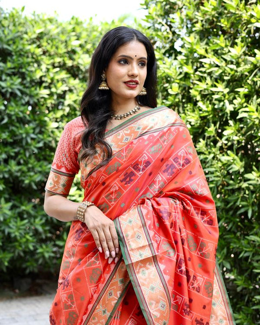 Orange Wevon Ikkat Patola Designer Handloom Silk Saree