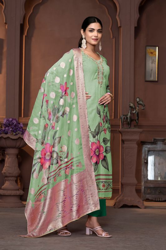 Green Cembric Cotton Wevon Designer With Printed And Hand Work Graceful Wedding Wear Salwar Kameez