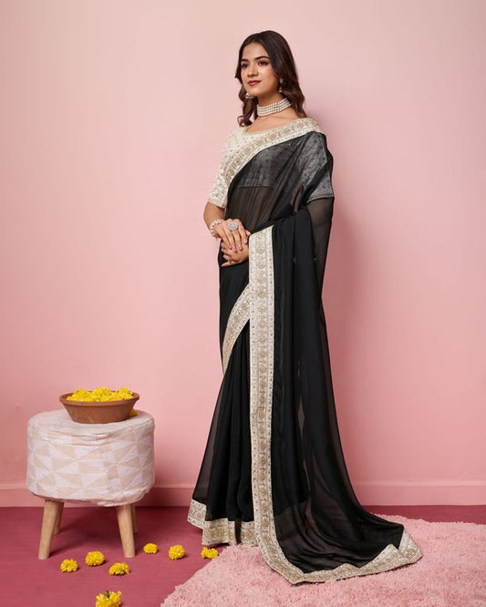 Girlie Black Color Organza Saree With Ethnic Embroidery Work On Border And Blouse