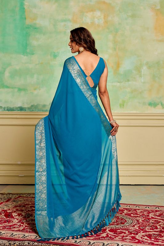 Blue Crepe Woven Saree and Stitched Blue Blouse