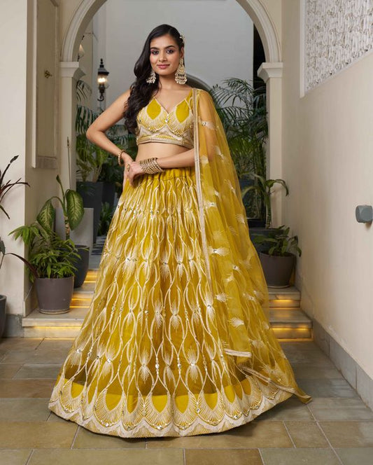 Mustard Yellow Color Net Fabric Lahenga With Sequins And Thread Embroidery Work