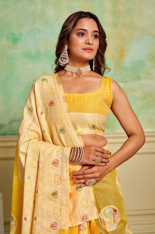 Yellow Cotton Woven Saree With Tassels on Pallu and Stitched Yellow Blouse