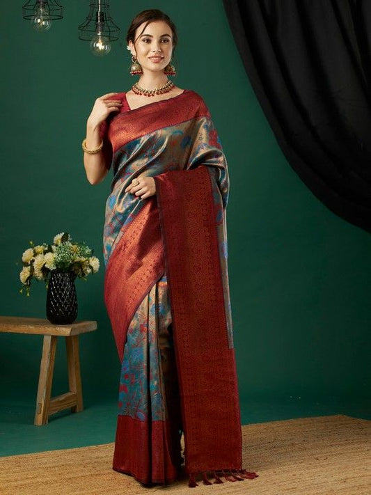 Blue Banarasi Woven Saree With Tassels on Pallu and Stitched Maroon Blouse