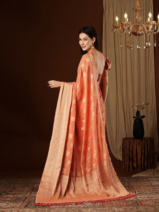 Peach Georgette Woven Saree With Tassels on Pallu and Stitched Peach Blouse