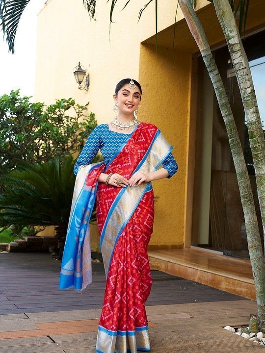 Red Crepe Digital Print Saree With Tassels on Pallu and Stitched Blue Blouse