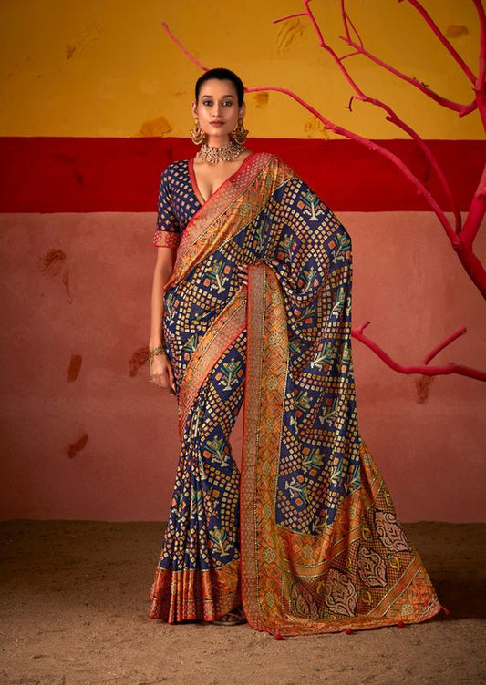 Ebony Clay Blue Wevon Border Designer With Patola Printed Silk Saree