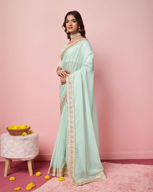 Girlie Sea Green Color Organza Saree With Ethnic Embroidery Work On Border And Blouse