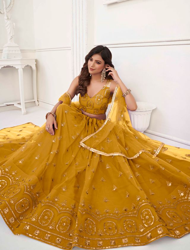 MUSTARD YELLOW COLOR NET FABRIC LEHENGA CHOLI