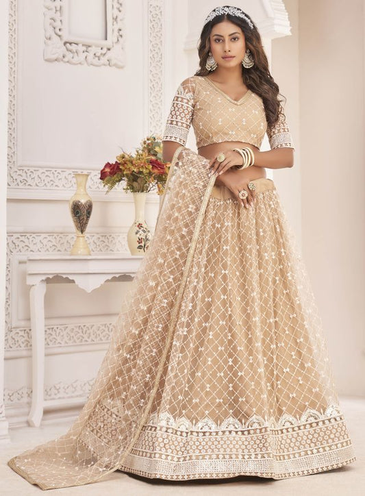 Beige embroidered net semi stitched lehenga