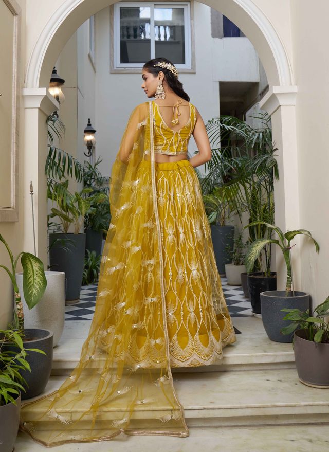 MUSTARD YELLOW COLOR NET FABRIC LAHENGA